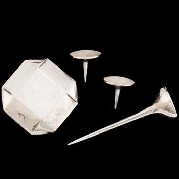 A silver Golf point, a box and two ball markers by Georg Jensen.