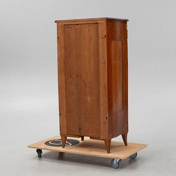 A mahogany veneered cabinet, end of the 19th Century.