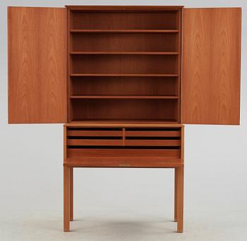 Carl Malmsten, A Carl Malmsten walnut and mahogany cabinet with floral inlays, Sweden 1959.