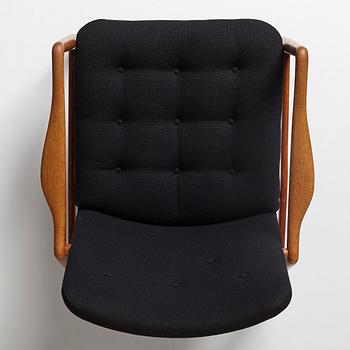 Finn Juhl, a "Bo59" teak easy chair, Bovirke, Denmark, 1950-60-tal.