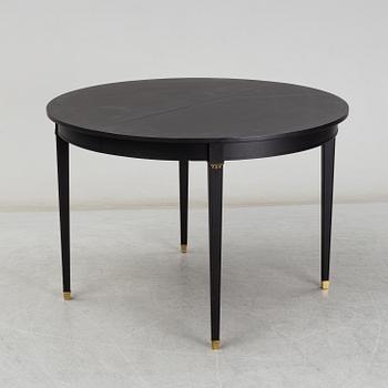 A Gustavian style painted dining table, second half of the 20th century.