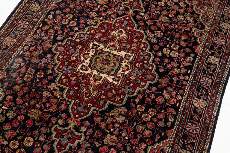 A semi-antique Sarouk rug, west Persia, c. 205 x 131 cm.