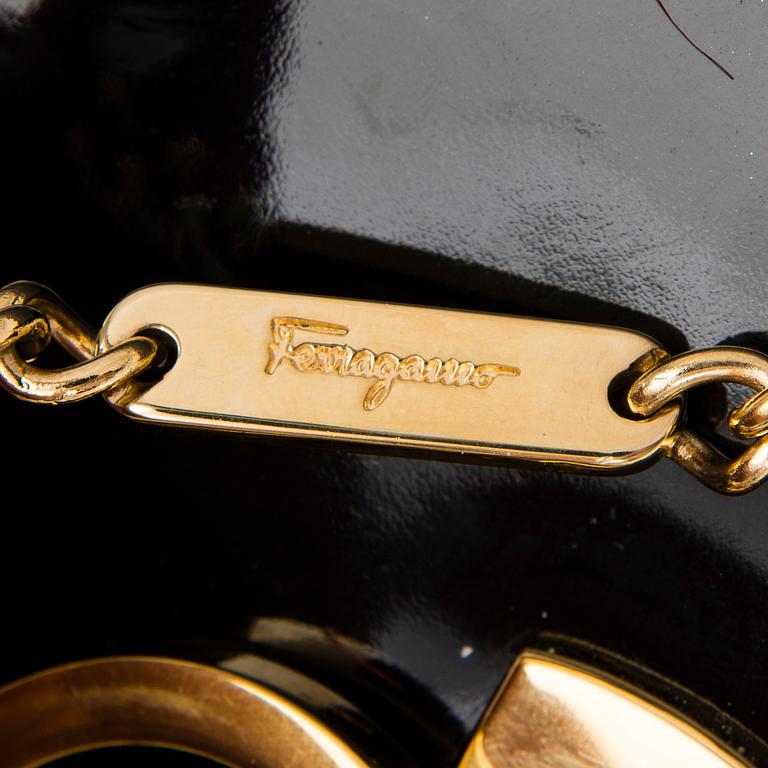 A SALVATORE FERRAGAMO Black Patent Leather Shoulder Bag.