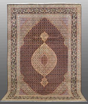 A CARPET, Tabriz part silk , so called 40 Radj, ca 298 x 202 cm.