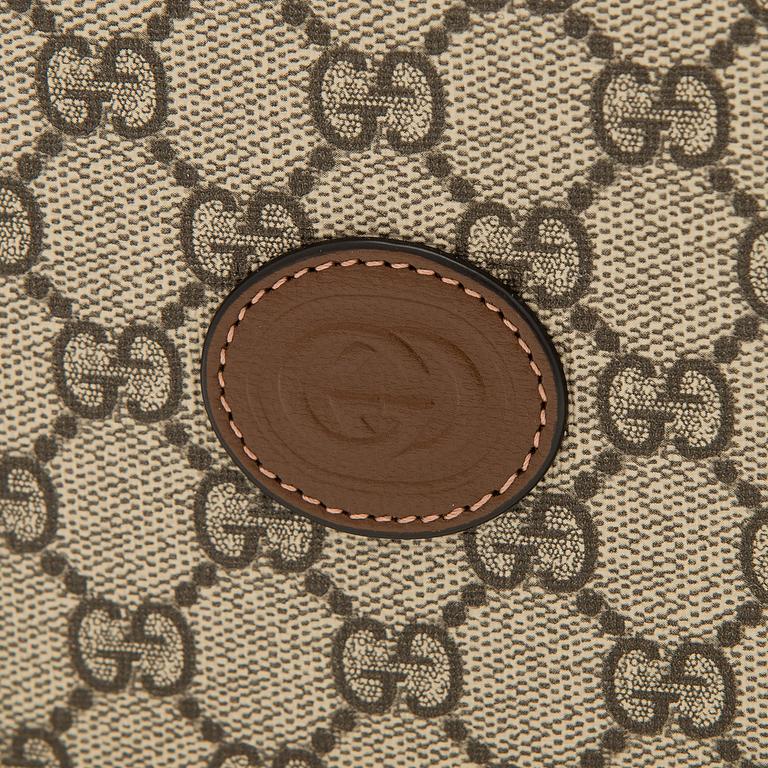 Gucci, "GG Supreme" laukku.