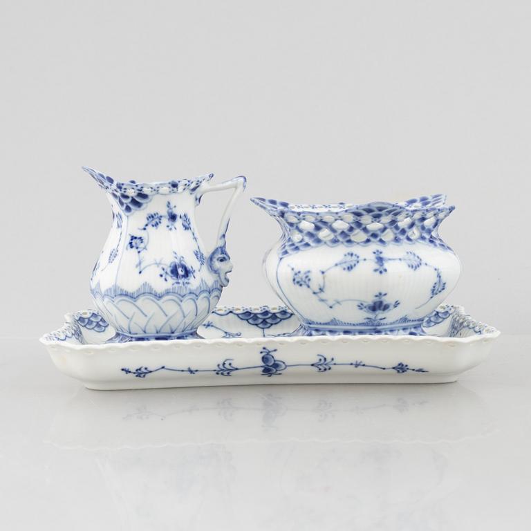 Royal Copenhagen, a 29-piece porcelain coffee service, full lace "Blue Fluted", Denmark.