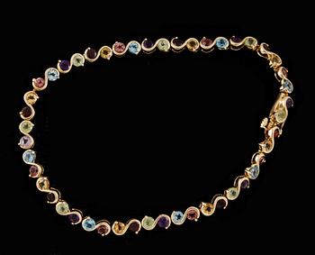 ARMBAND, 18k guld med olikfärgade citriner och ametister. Vikt 8,2g.