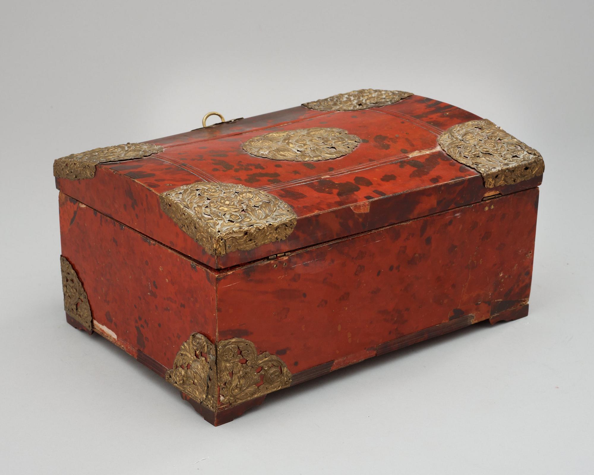 A Baroque 18th century tortoiseshell veneered casket.