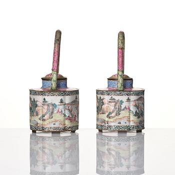 A Chinese pair of enamel on copper tea pots, Qing dynasty, Qianlong (1736-95).