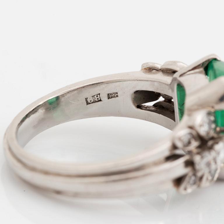 A WA Bolin 18K white gold ring set with a cabochon-cut emerald.