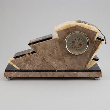 A three piece clock garniture, Art Deco style, 20th Century.