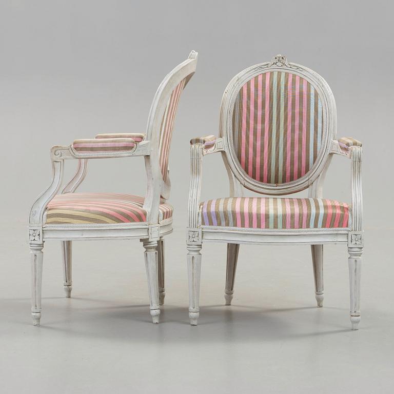 A pair of Gustavian late 18th century armchairs by Erik Öhrmark, master 1777.