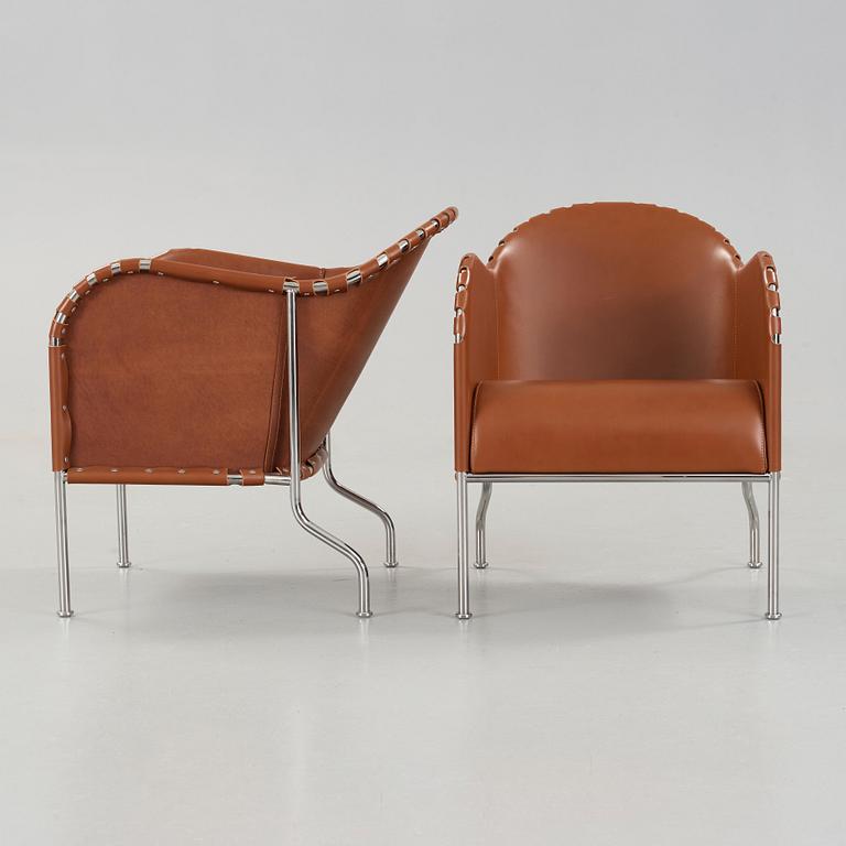Mats Theselius, A pair of 'Bruno' brown leather and steel easy chairs, Källemo, Sweden.