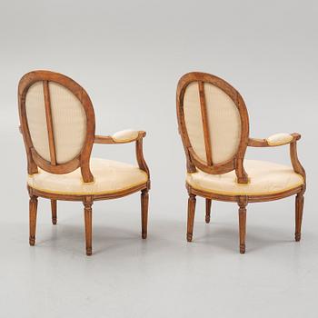 A pair of Louis XVI open armchairs by Niclas-Louis Mariette (maître menuisier in Paris 1765-89).
