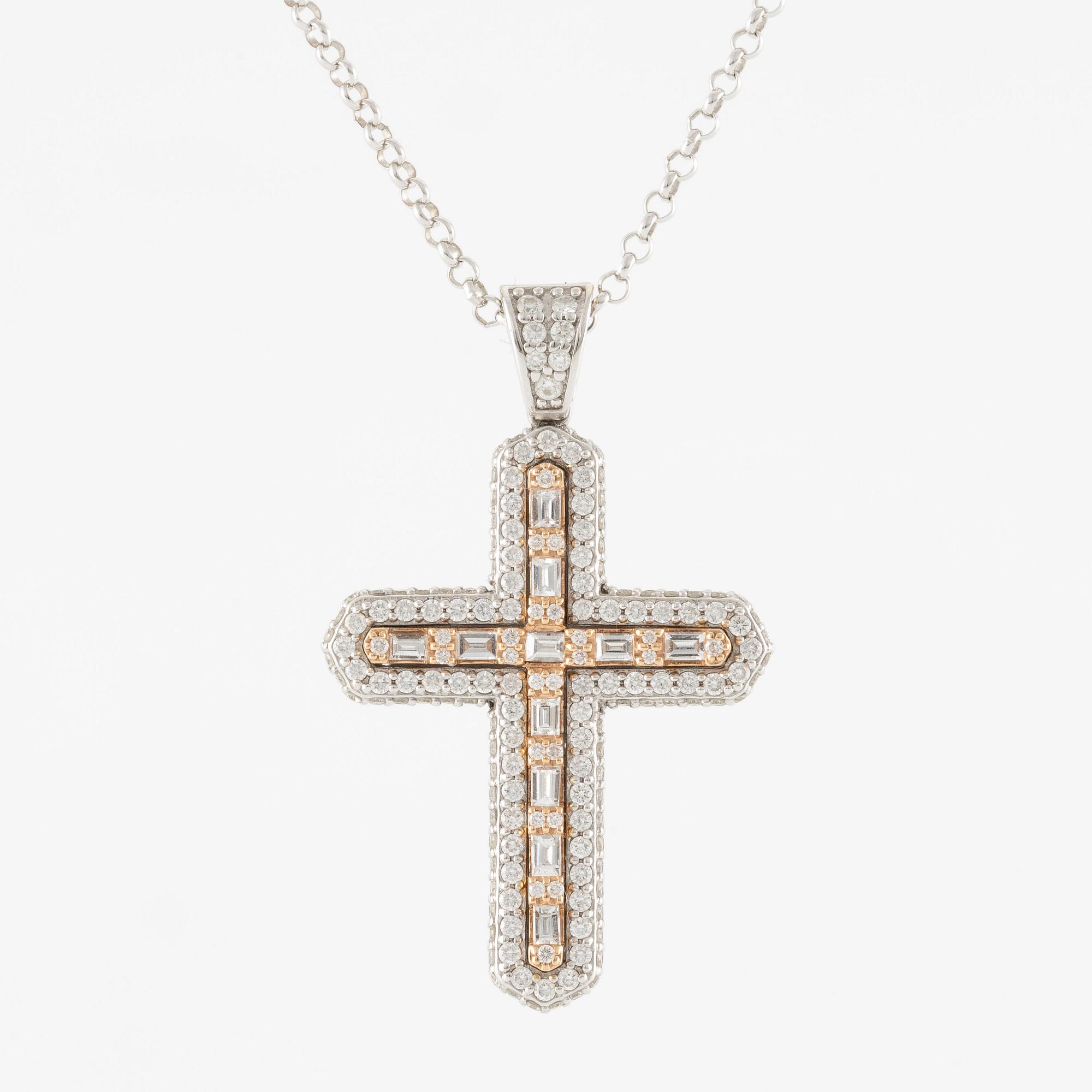 Necklace, 18K white gold in the form of a cross, set with baguette and brilliant-cut diamonds.