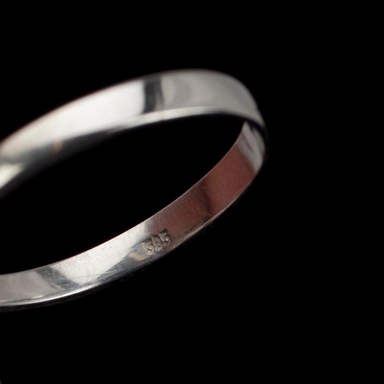 RING, vitguld 14K samt diamanter tot. ca 0,24 ct. Tot. vikt ca 3,5 g.