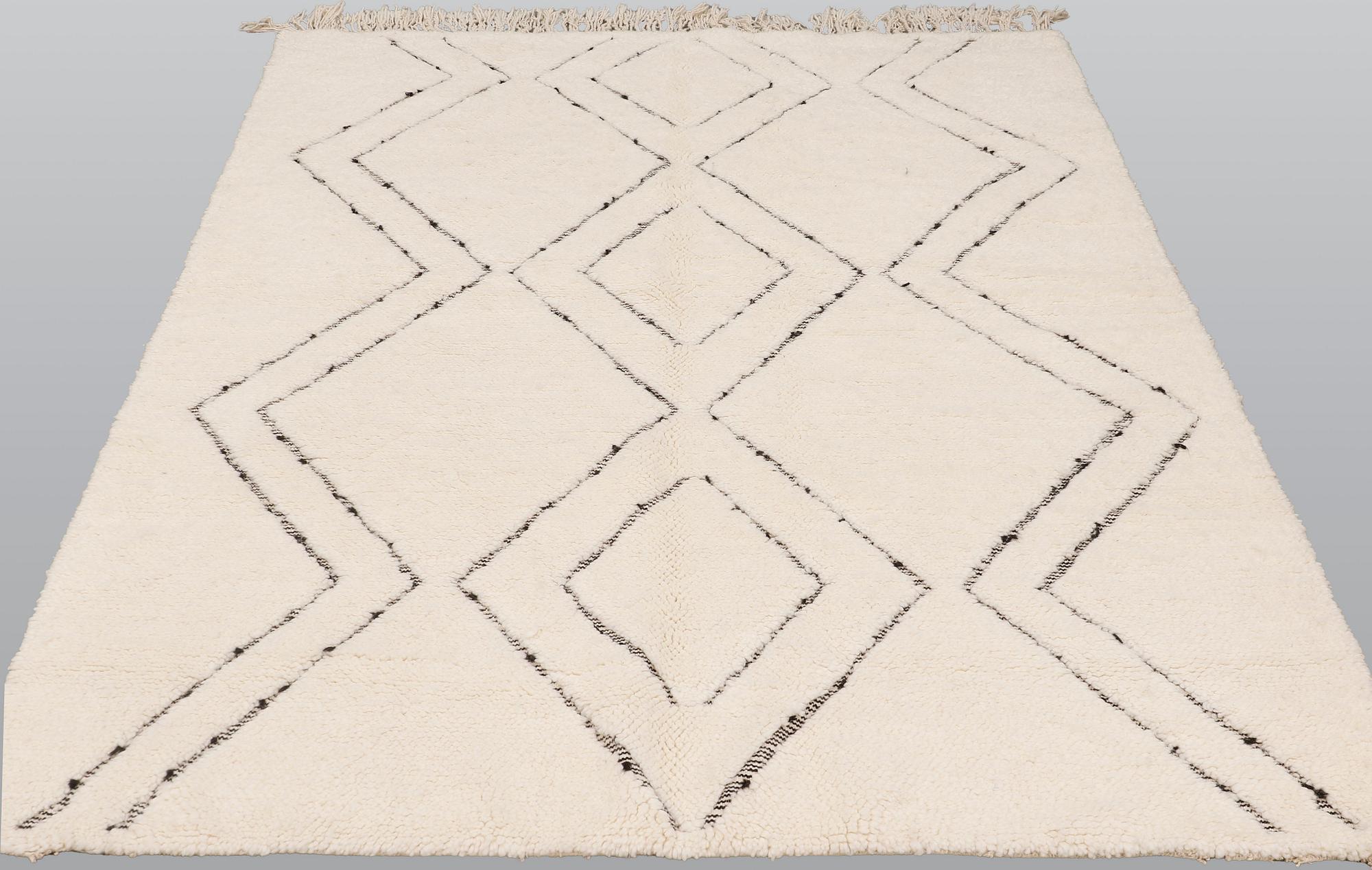 A moroccan carpet, ca 218 x 165 cm.