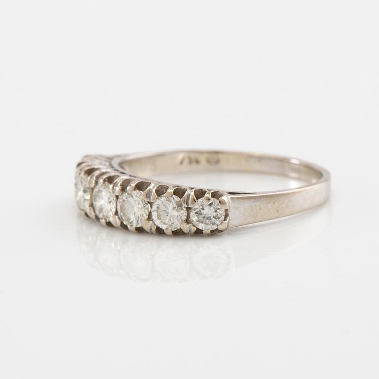 Half-eternity ring in 18K white gold set with round brilliant-cut diamonds, approximately 0.93 ct in total.