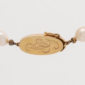 PÄRLCOLLIER odlade pärlor ca 7,5 mm lås i 18K guld , längd ca 85 cm.