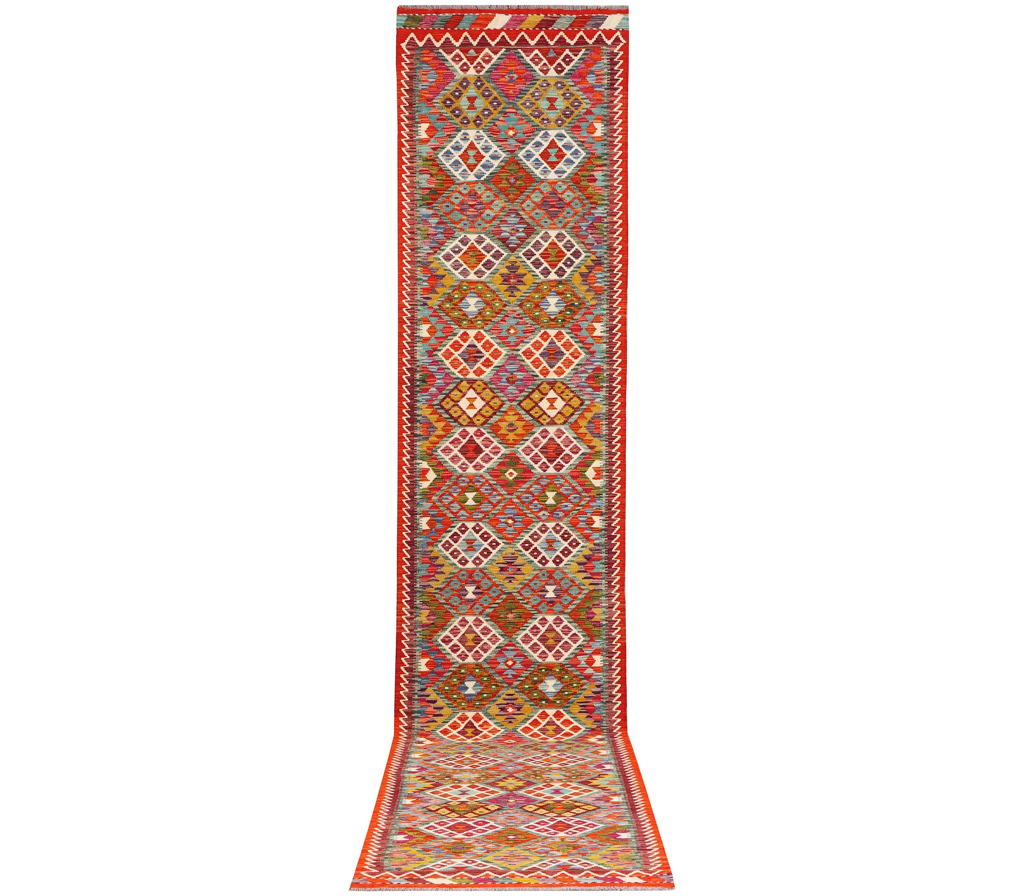 A Kilim carpet, c. 482 x 63 cm.