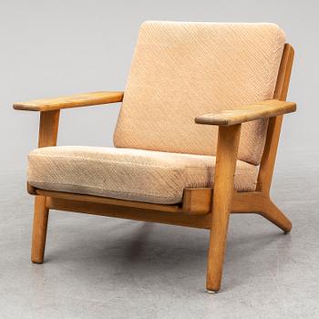 HANS J WEGNER, an oak 'GE-290' easy chair from Getama, Denmark.