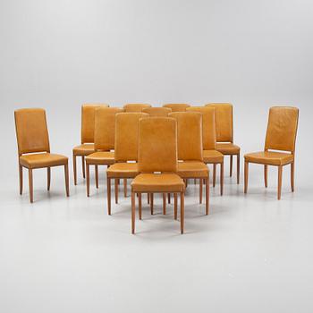 Carl Malmsten, a set of twelve, mahogany and leather chairs. Åfors Möbelfabrik.