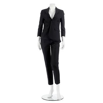 DSQUARED, a black cotton and silk two-piece suit consisting of jacket and pants. Size 42.