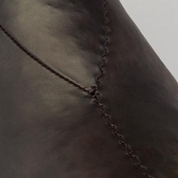 DIMITRI OMERSA & CO, a leather stool in the shape of a bull.