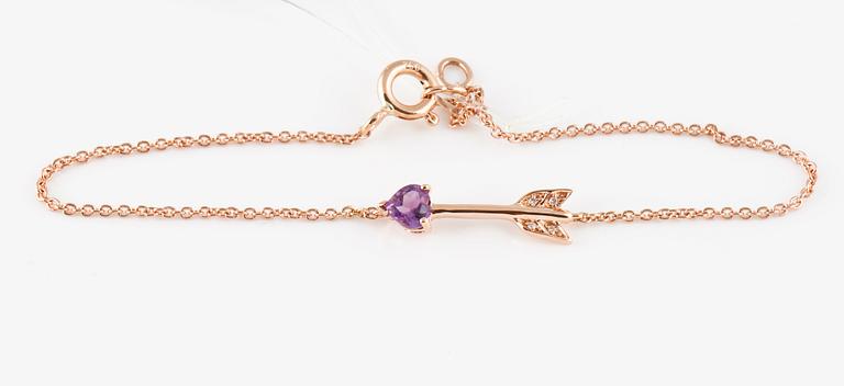 ARMBAND, 18K roséguld med 4 små briljantslipade diamanter samt fasettslipad ametist ca 0.20 ct. Vikt 1,4 gram.