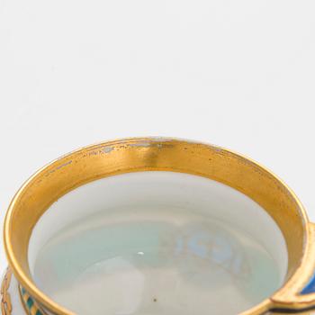 A cup and saucer from the Derzhava service, Imperial Porcelain Manufactory, St. Petersburg, late 19th century.