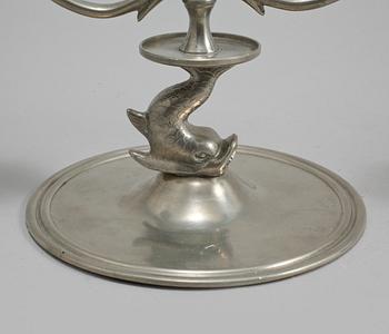 LJUSSTAKAR, ett par, tenn, Firma Svenskt Tenn, Stockholm, 1927.