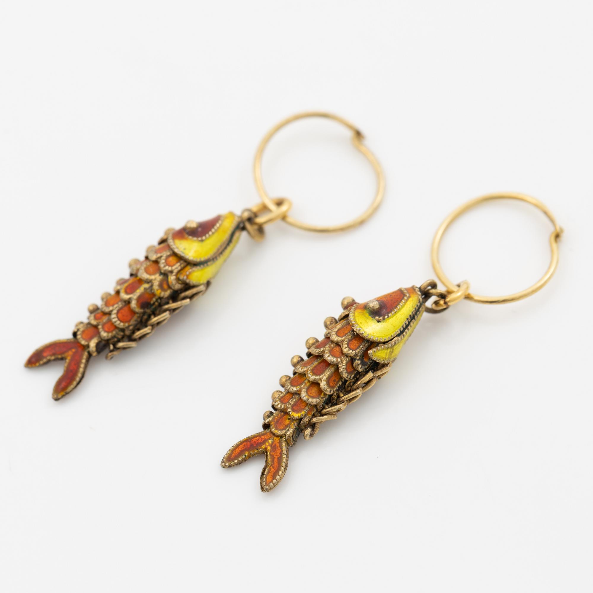 Silver earrings with enamel in the shape of fish.