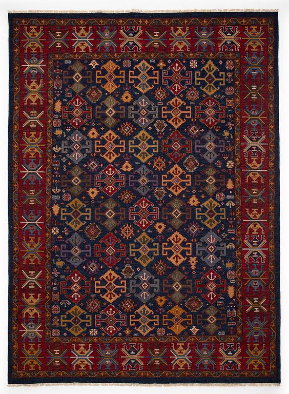 A carpet, Ushaq Design, ca 368 x 269 cm.