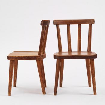 Axel Einar Hjorth, a set of six stained pine "Utö" chairs, Nordiska Kompaniet, Sweden, 1930s.