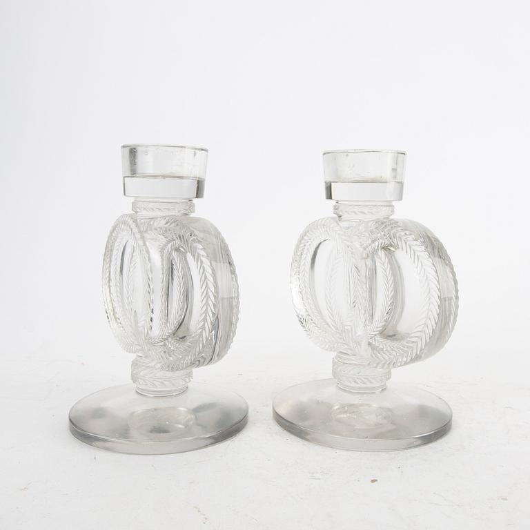 A pair of Lalique glass candle sticks later part of the 20th century.