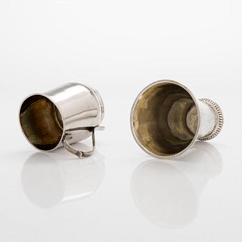 Bägare, 2 st, silver, Daniel Lundström, Stockholm 1765 och  ET, Ekenäs, Finland 1883.
