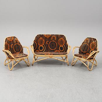 A sofa and two easy chairs, 1960s.