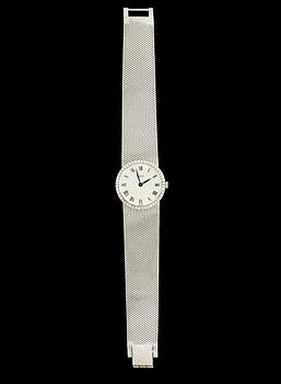 DAMARMBANDSUR, 18k vitguld med åttkantslipade diamanter, Piaget. Vikt ca 46 g.