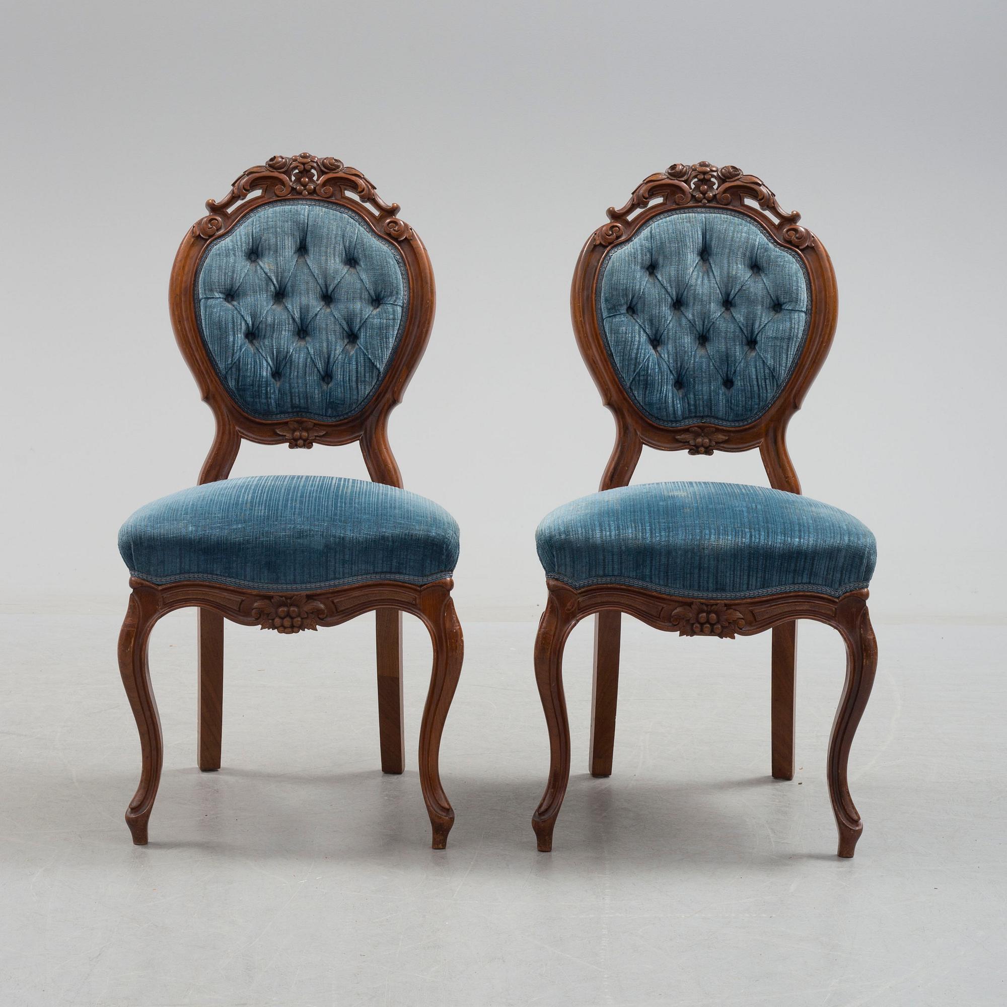 Six late 19th century walnut chairs.