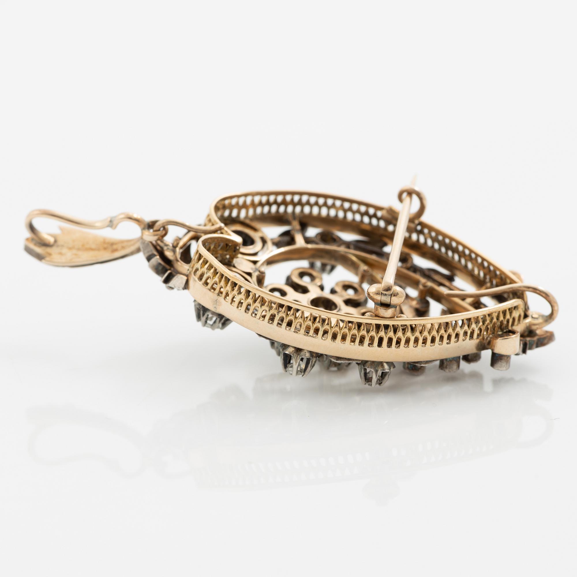 Brooch/pendant in 18K gold and silver set with old-cut and rose-cut diamonds, circa 1900.