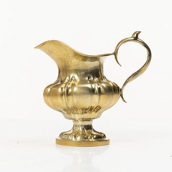 A Russian silver-gilt cream jug, Minsk, 1860s.