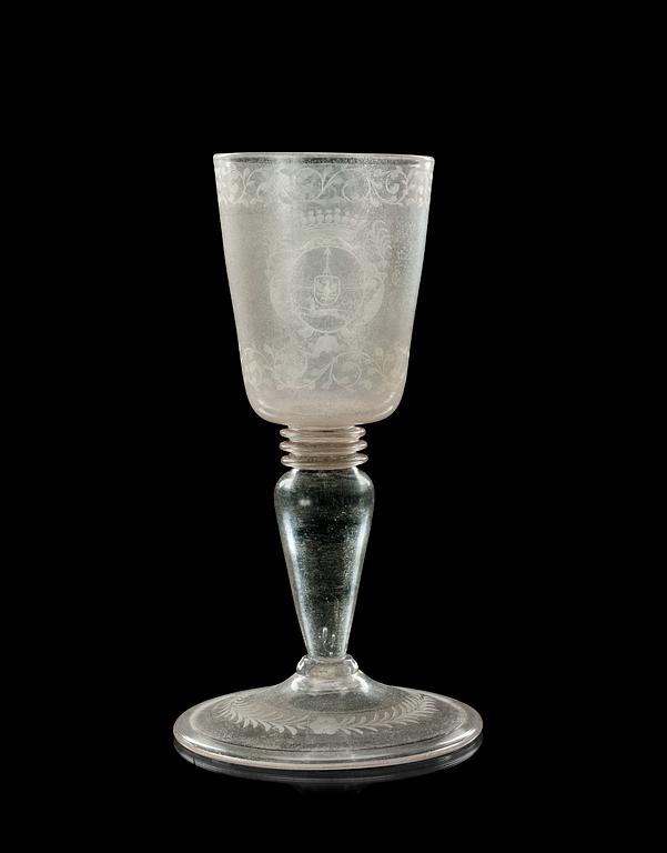 A late barocque engraved armorial goblet, first half of 18th Century, presumably Kungsholms glasbruk.