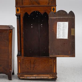 A long-case clock, England, 19th century.