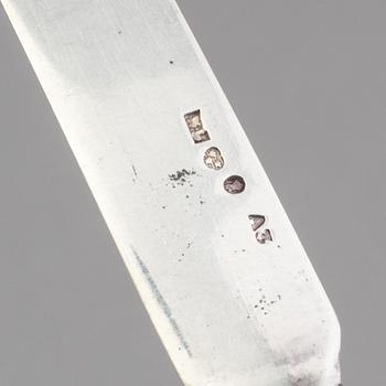 A set of 10 silver fruit knives, Stockholm, 1807 and a mixed lot of  silver fruit forks. Weight 600 g.
