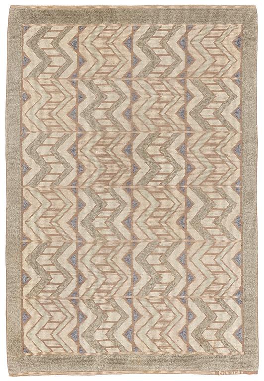 Brita Grahn, a carpet, knotted pile in relief, ca 239 x 168 cm (as well as 2,5 and 3,5 cm flat weave on each side), signed.