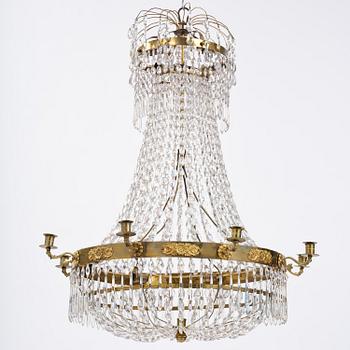 A Swedish late Empire gilt brass nine-light chandelier, 1830's.
