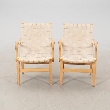 Bruno Mathsson, a pair of "Eva" armchairs for DUX, late 20th century.