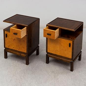 A pair of 1930s bedside tables.