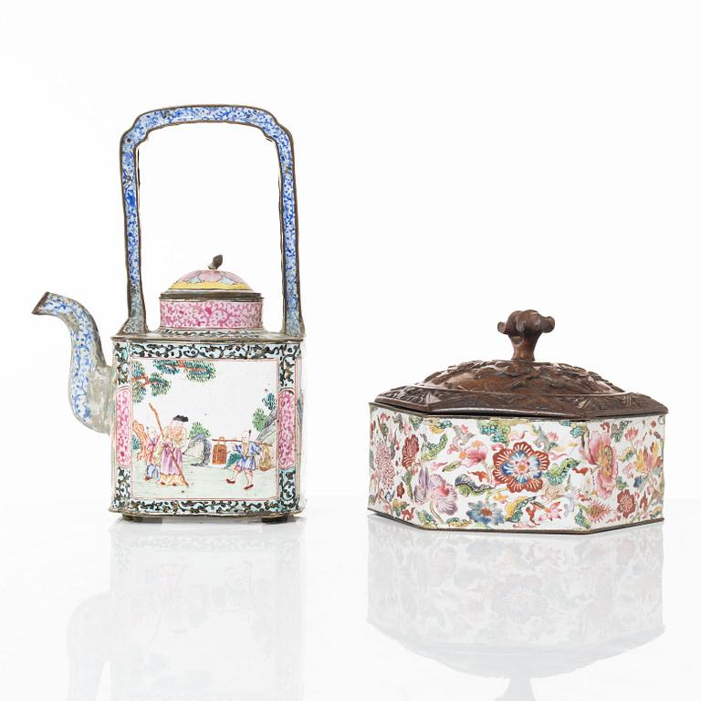 A Chinese enamel on copper teapot and an enamel box with carved wooden cover, Qing dynasty, 18th century.