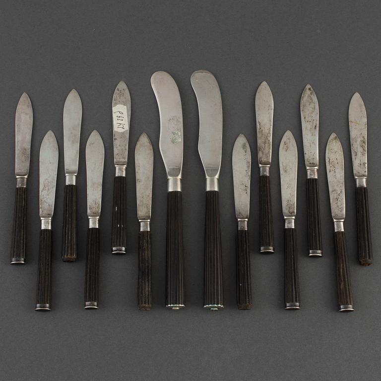 A pair of butter knifes and twelve fruit knifes. Sweden 19th century.